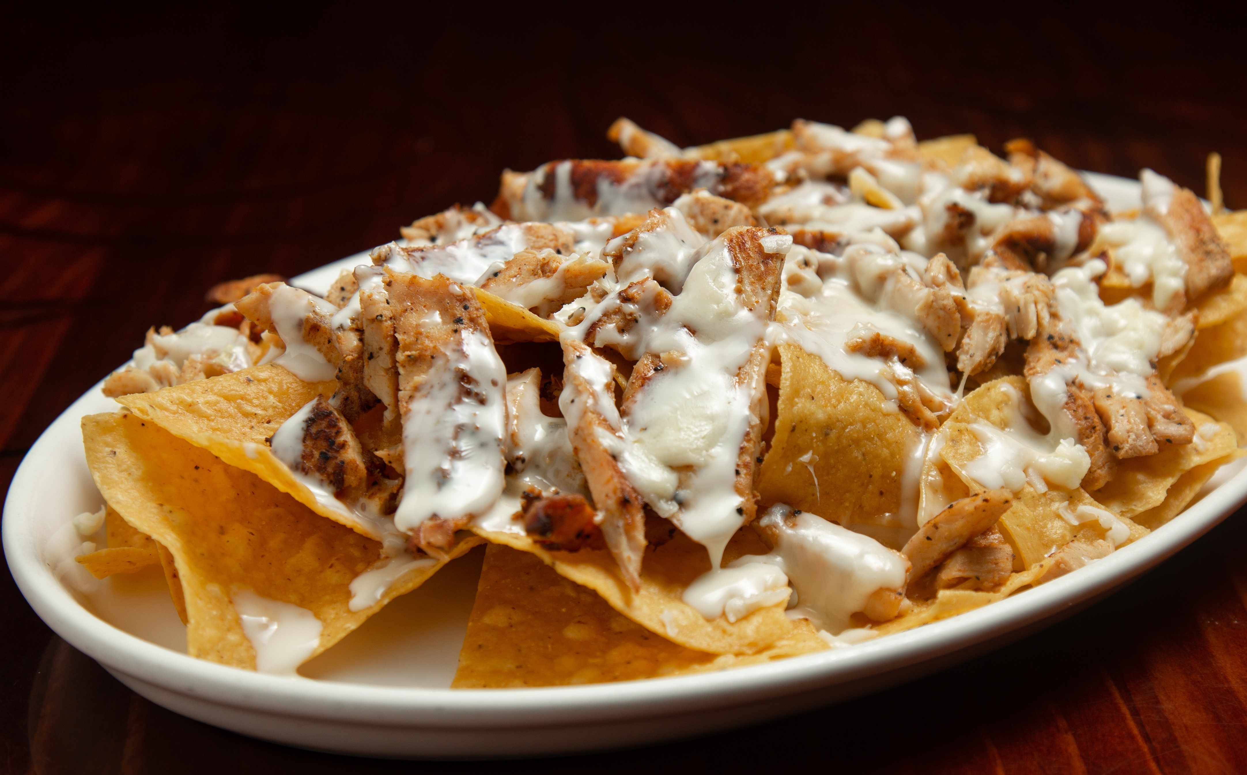 Order Grilled Chicken Nachos food online from Tito Mexican Restaurant store, Spring Hill on bringmethat.com