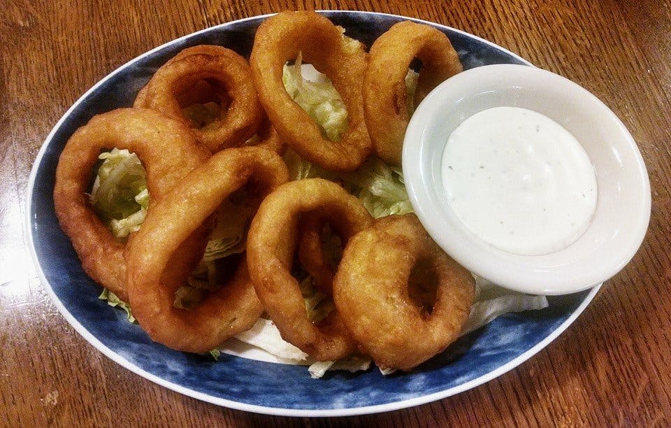 Order Onion Rings - Appetizer food online from Roma Pizza 2 store, Church Hill on bringmethat.com