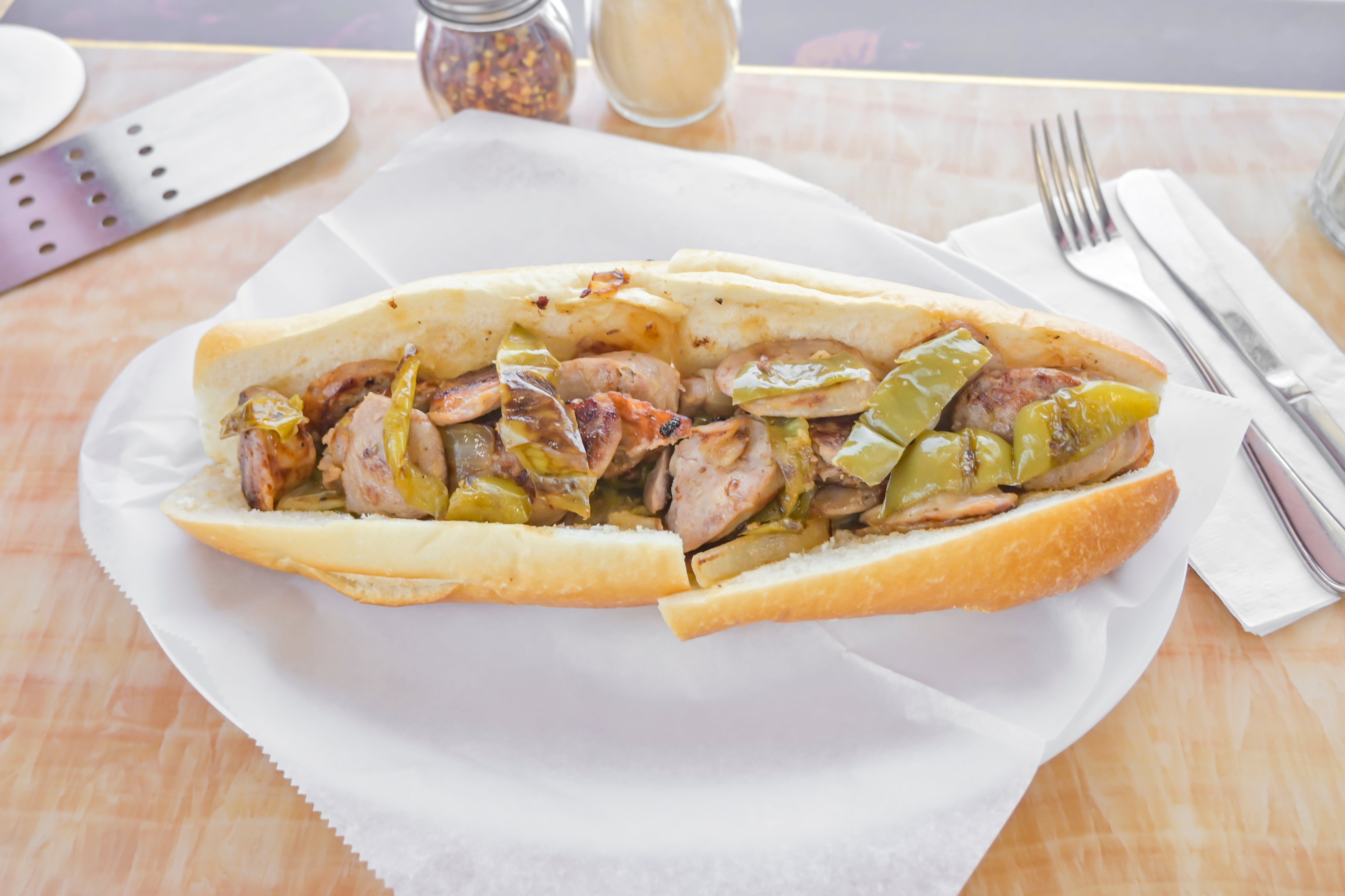 Order Sausage, Peppers & Onions Sandwich - Sandwich food online from Tuscan Pizza store, Sicklerville on bringmethat.com