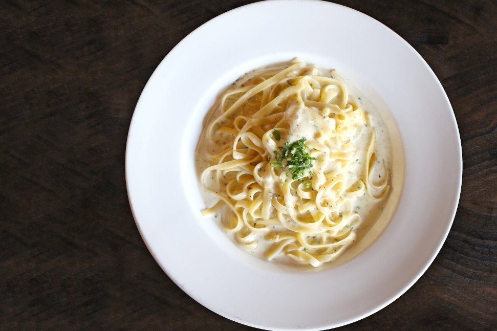 Order GF Penne Alfredo food online from Rocco's Pizzeria store, Kingwood on bringmethat.com