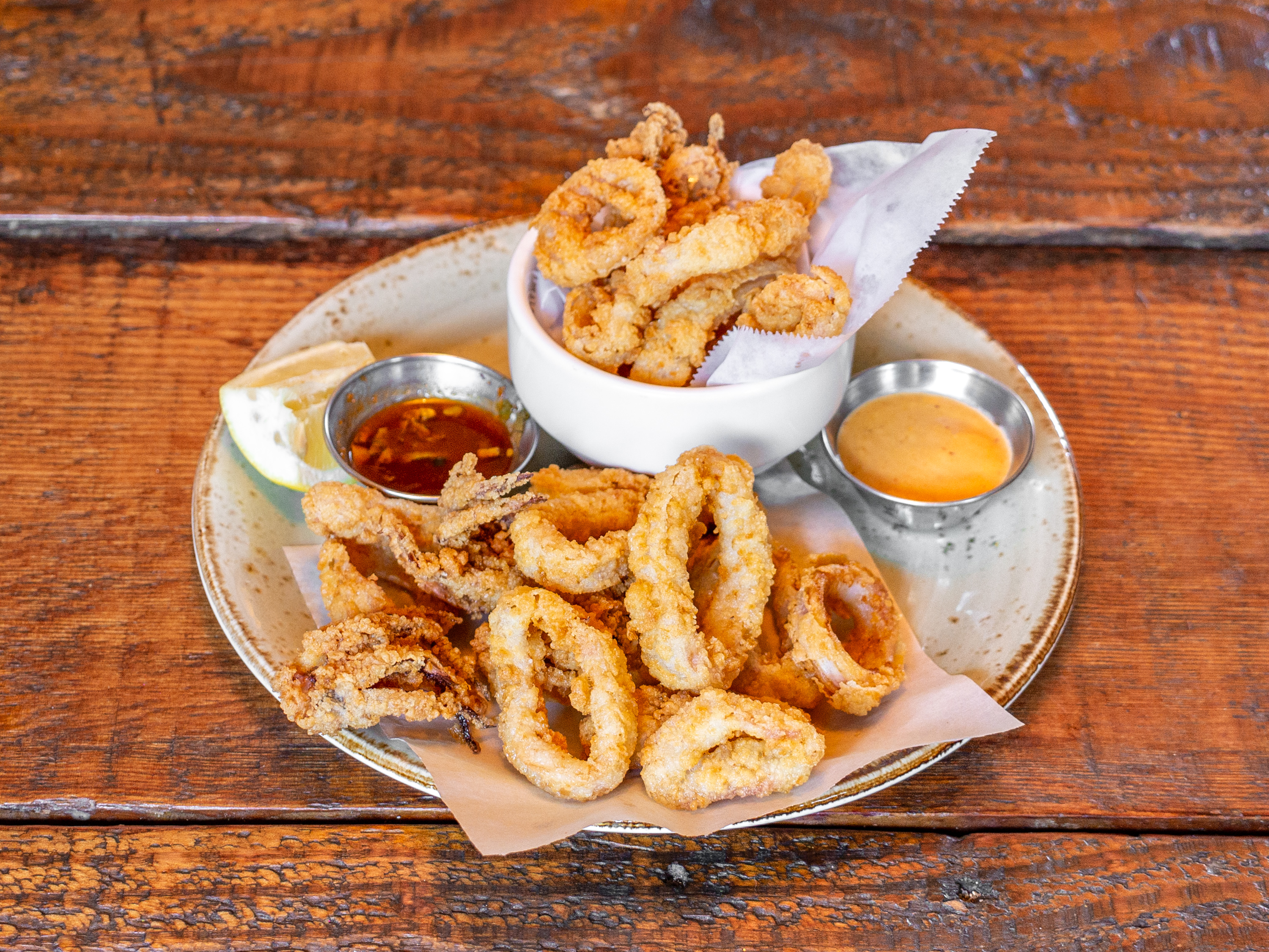 Order Crispy Calamari food online from Rustic House Oyster Bar and Grill store, San Carlos on bringmethat.com