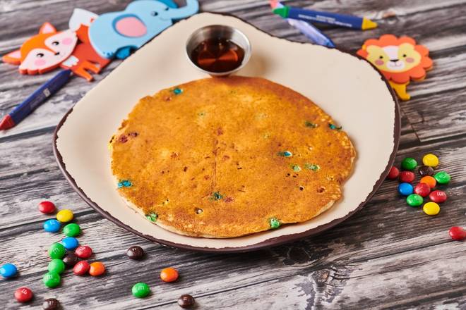 Order Kid's Rainbow Pancake food online from Egg Harbor Cafe store, Elmhurst on bringmethat.com