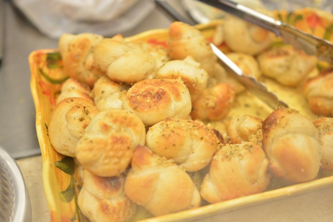 Order Garlic Knots - 6 Pieces food online from Pizza Place store, Bronx on bringmethat.com