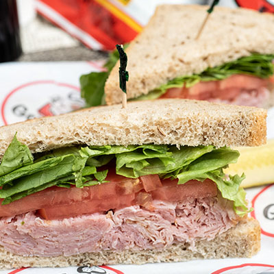 Order *Ham Sandwich food online from Groucho's Deli store, Columbia on bringmethat.com