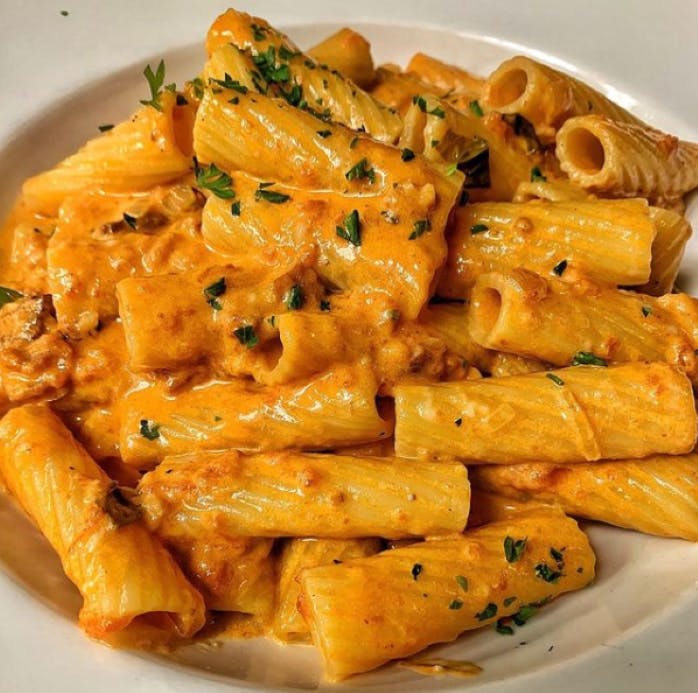Order Rigatoni Alla Vodka - Pasta food online from Gino's Of Tuscany store, Bethpage on bringmethat.com