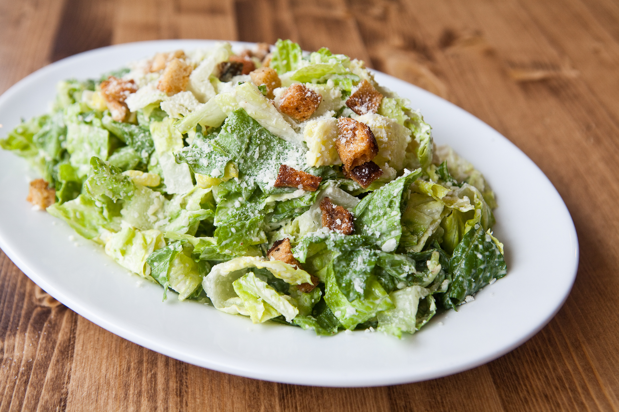 Order Caesar Salad food online from Sliced By Harlem Pizza Co store, New York on bringmethat.com