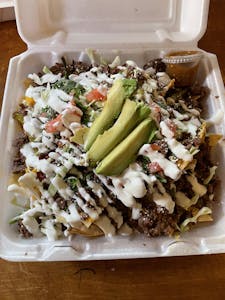 Order Nacho Supreme food online from Tio Chema store, Porterville on bringmethat.com