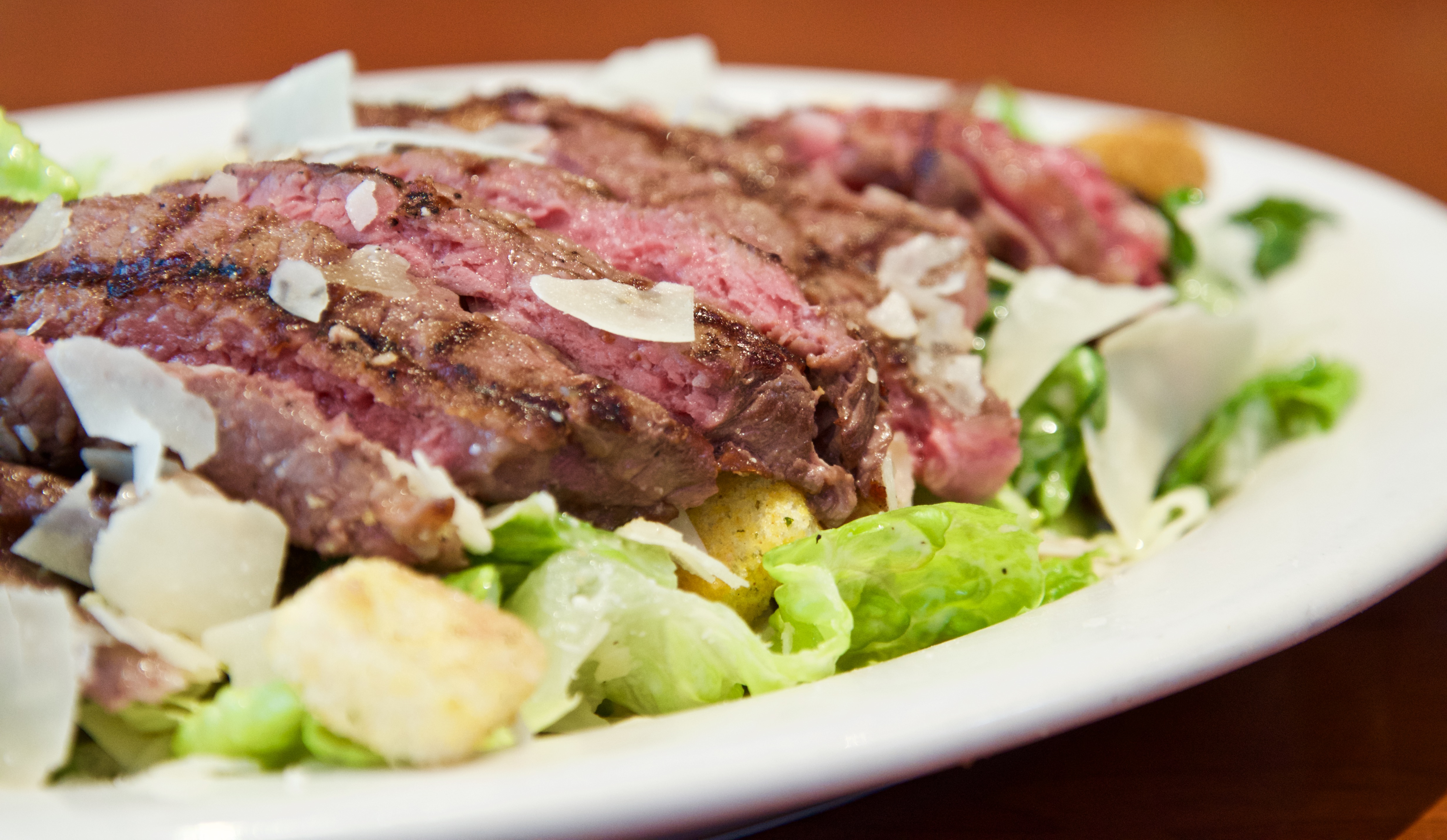 Order "Prime Rib" Caesar Salad food online from Tops American Grill, Bakery, & Bar store, Schenectady on bringmethat.com