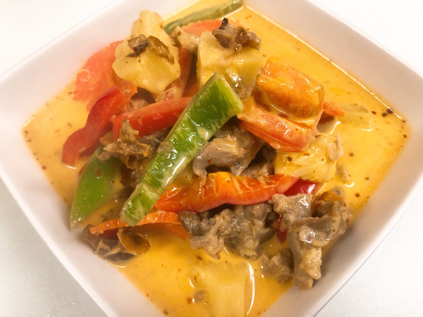 Order C7. Roasted Duck Curry food online from Luv n Eat Thai Cuisine store, Camarillo on bringmethat.com