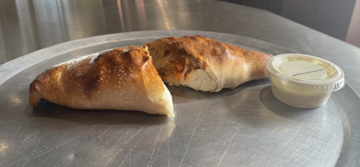 Order Buffalo Chicken Calzone food online from Johnny's Pizza store, Cary on bringmethat.com