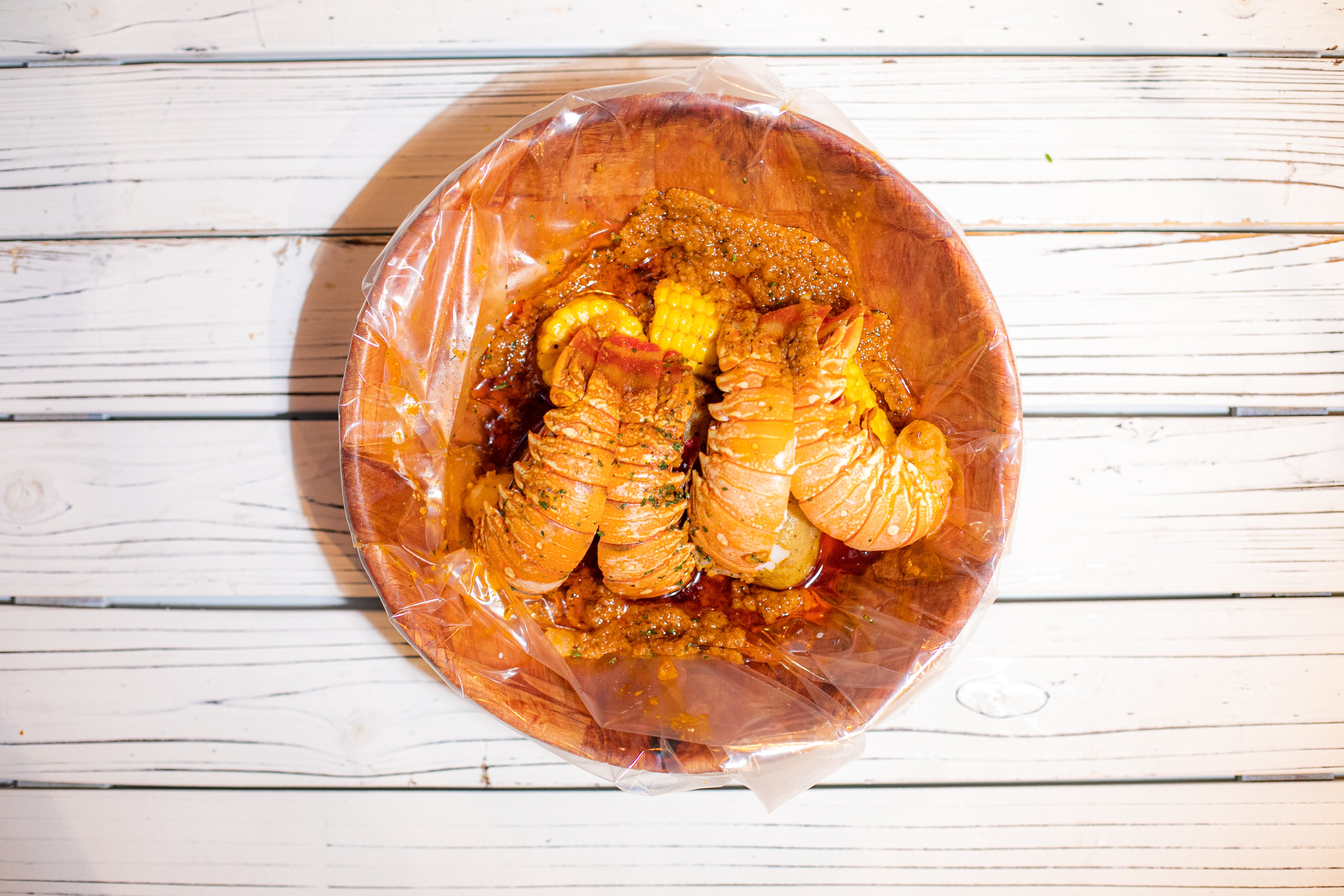 Order 2 Lobster Tail food online from Ben's Crab store, Uniondale on bringmethat.com