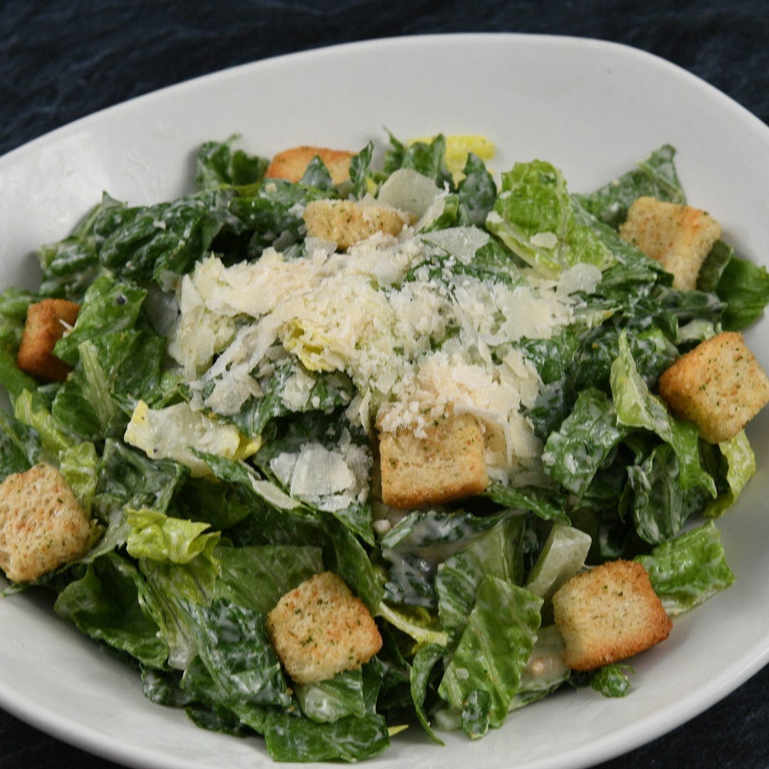 Order Little Islander Caesar Salad food online from Rainforest Cafe store, Las Vegas on bringmethat.com