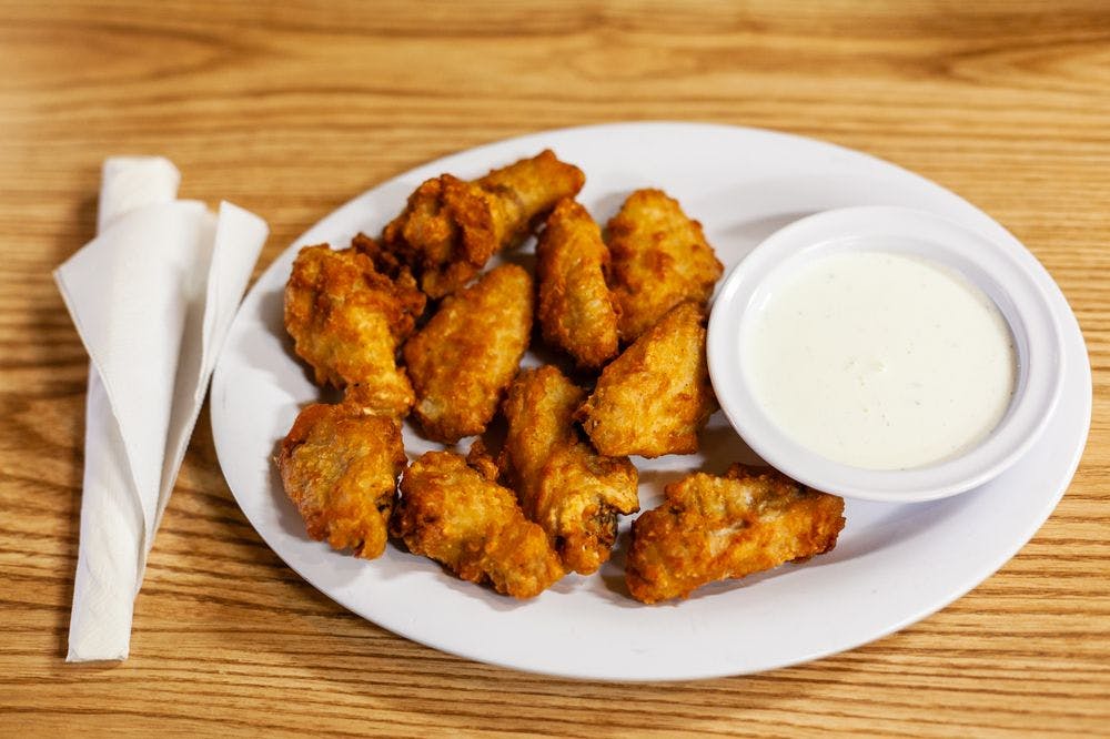 Order Chicken Wings - 15 Pieces food online from Italian Pizzeria store, Durham on bringmethat.com