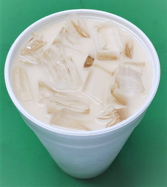 Order Horchata 32oz food online from 3 Aguilas Taqueria store, Denton on bringmethat.com
