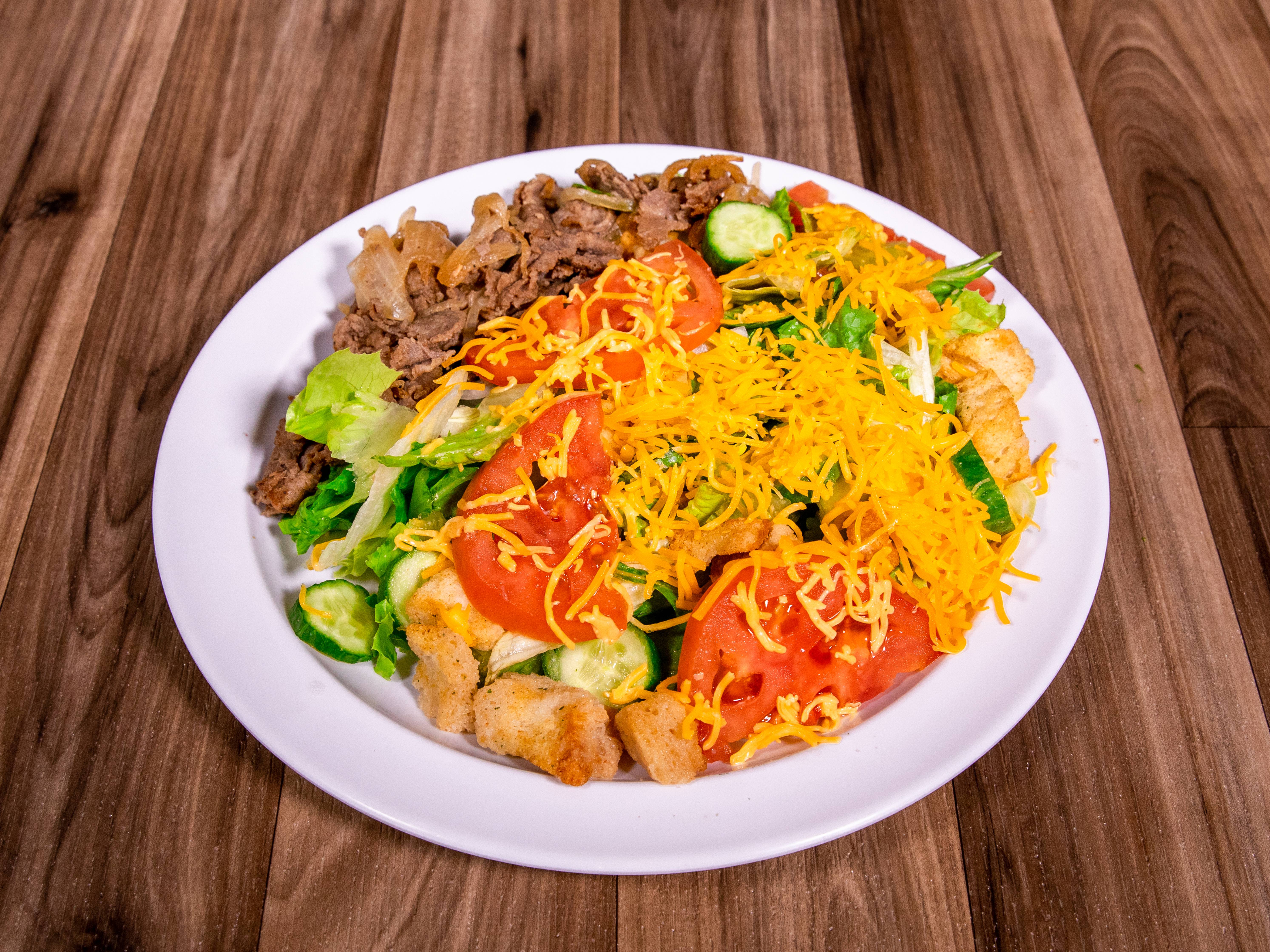 Order Phil's Standard Steak Salad food online from Genghis Grill store, Hurst on bringmethat.com