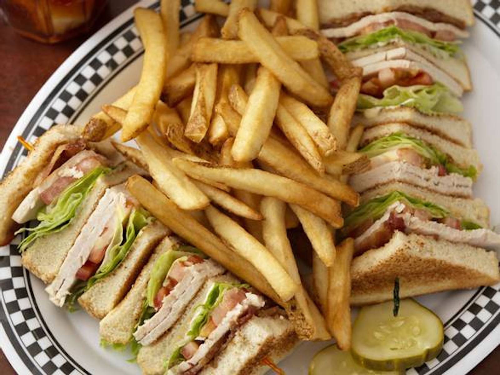 Order Turkey Club food online from Deluxe Diner store, Chicago on bringmethat.com