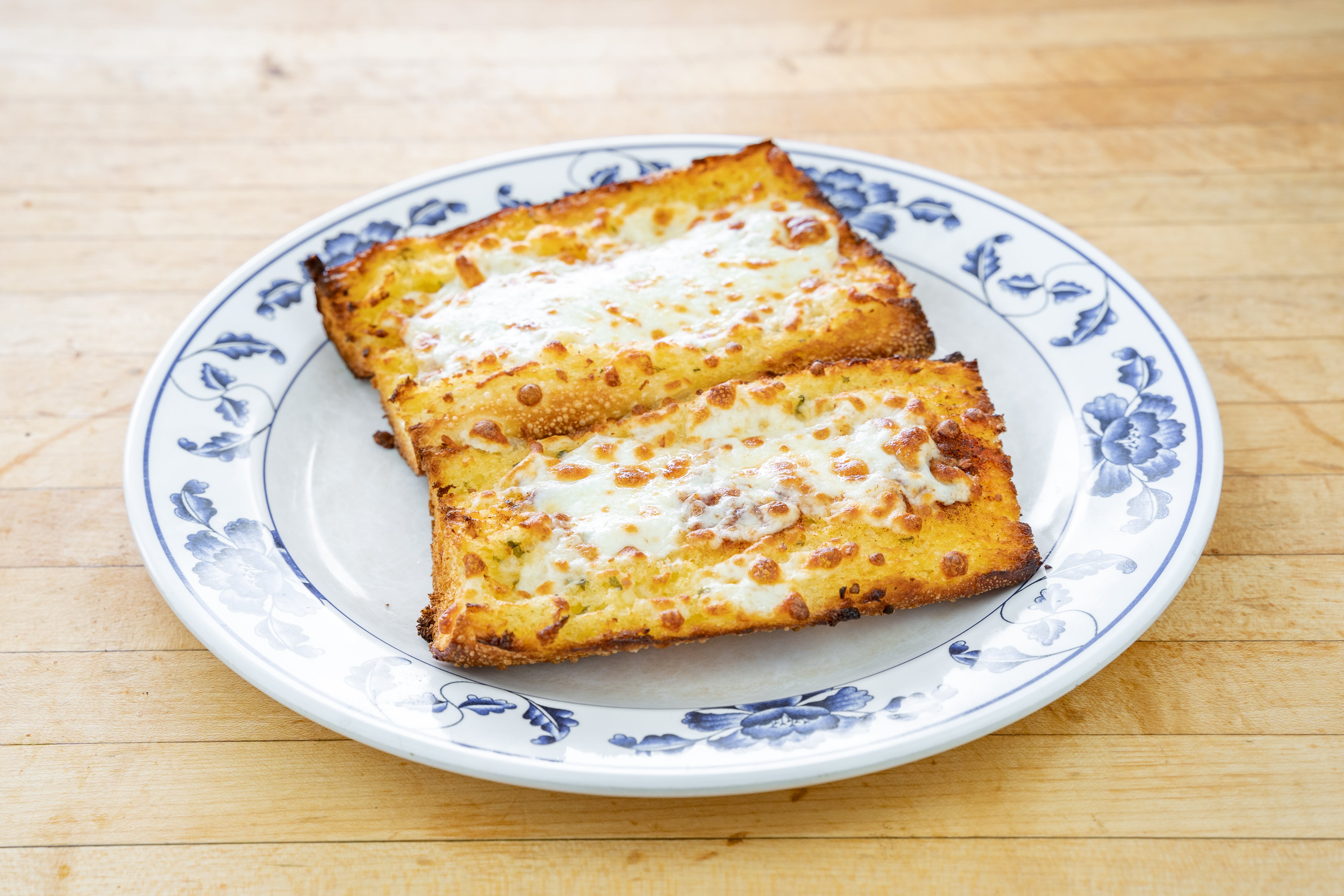 Order Garlic Bread with Mozzarella - 8'' food online from Checkers pizza and ribs store, San Jose on bringmethat.com