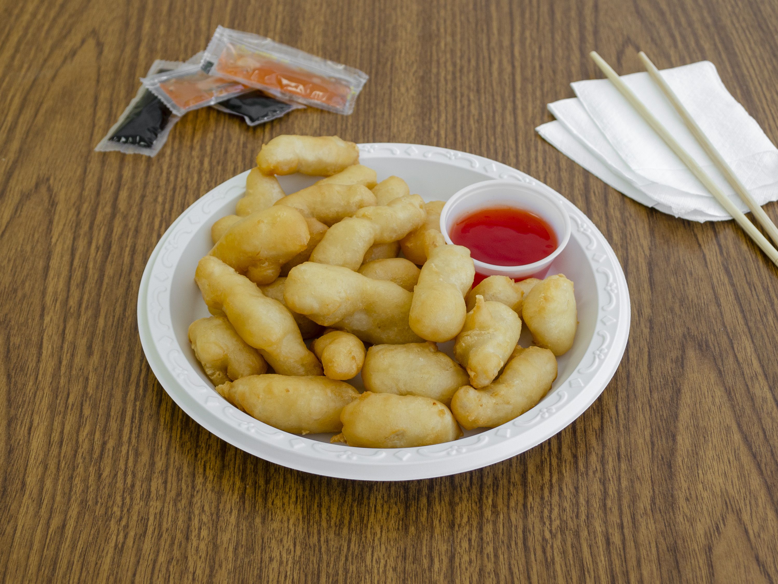 Order 111. Sweet and Sour Chicken food online from New China Restaurant store, Huntington on bringmethat.com