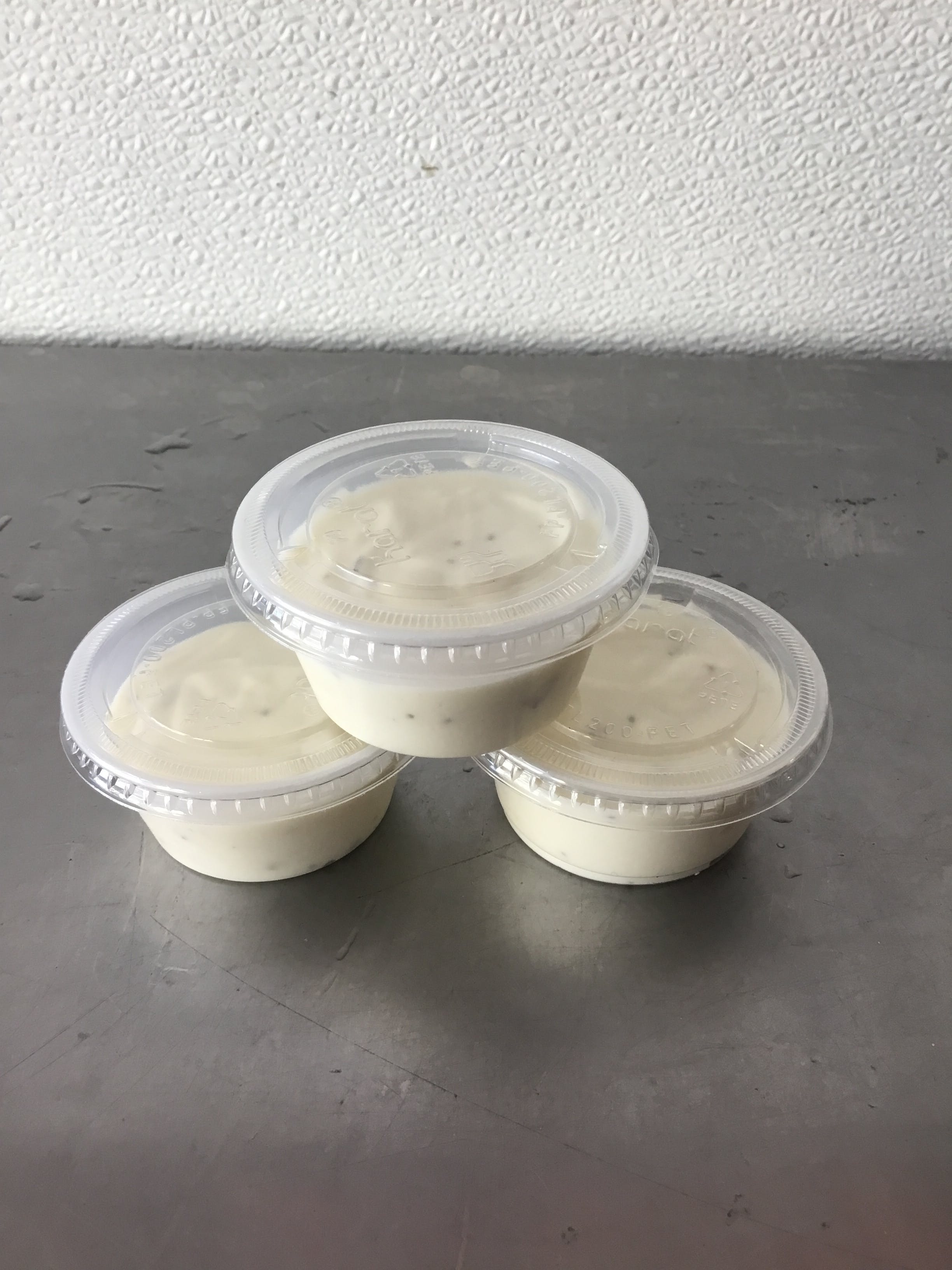 Order Side of Ranch Dressing - Side food online from Vinnie Pizzeria store, Martinez on bringmethat.com