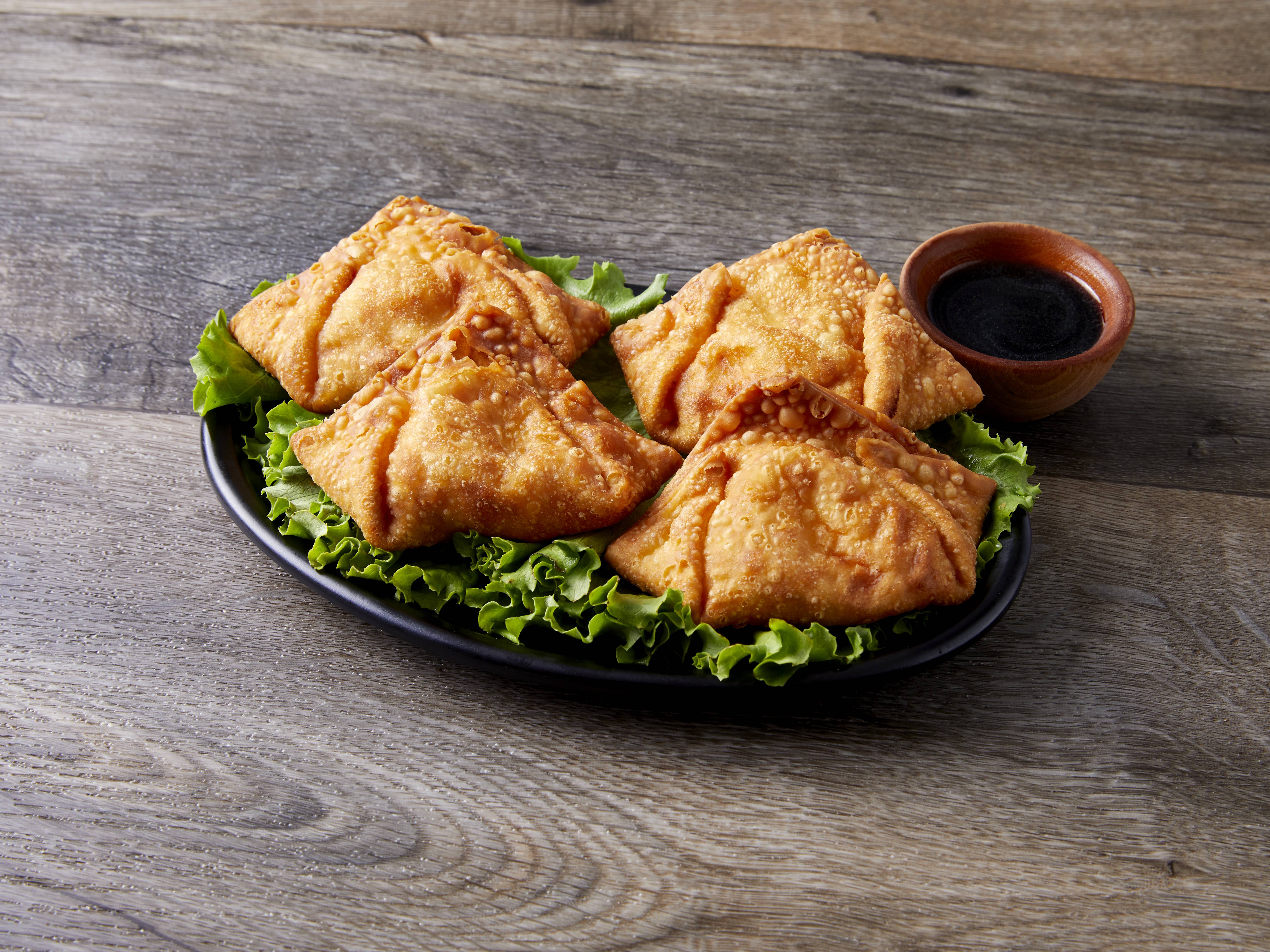 Order 4. Crab Rangoon food online from New China 2 store, Chicago on bringmethat.com