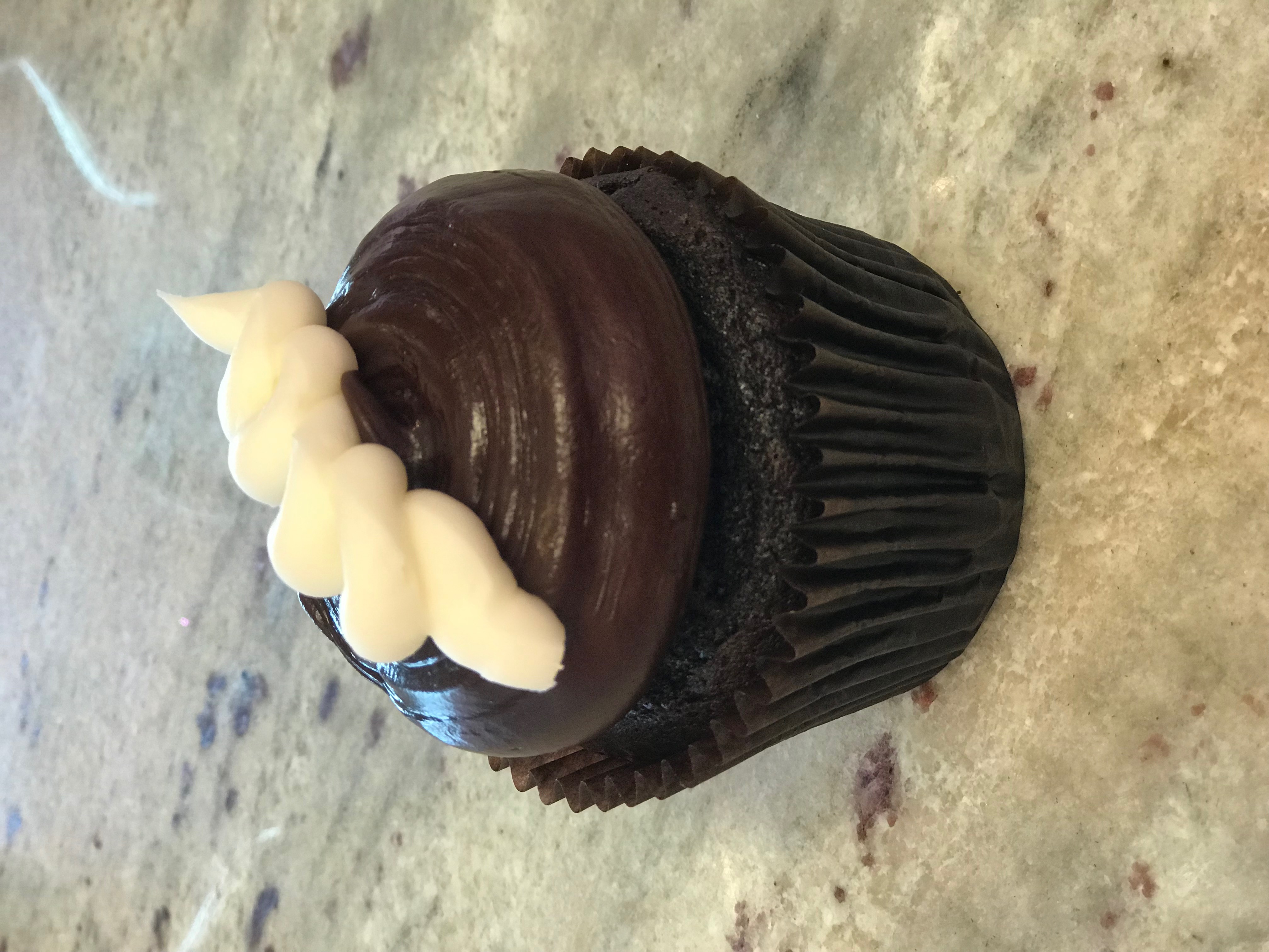 Order Chocolate Cream Cupcake food online from Smallcakes store, Springfield on bringmethat.com