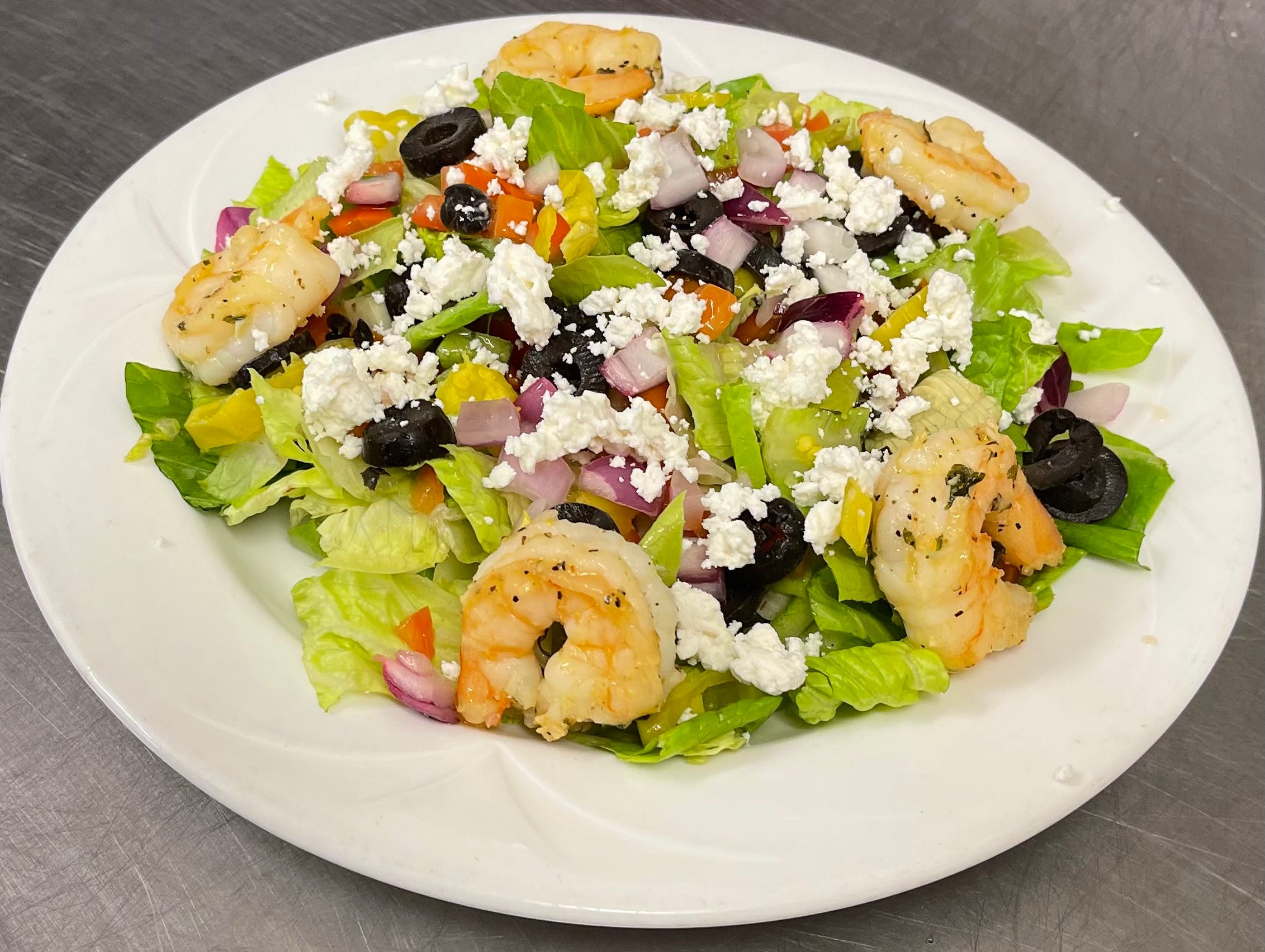 Order Greek Salad - Small food online from Luigis Italian Restaurant store, Uvalde on bringmethat.com