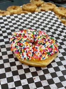 Order Sprinkle Donut food online from Bearscat Bakery store, Mesa on bringmethat.com
