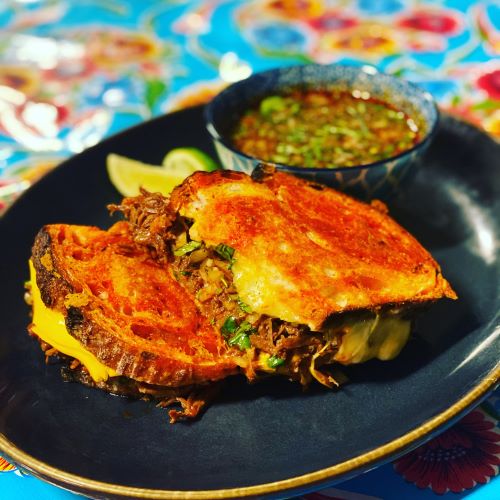 Order Birria Grilled Cheese  food online from Suavecito Birria & Tacos store, San Mateo on bringmethat.com