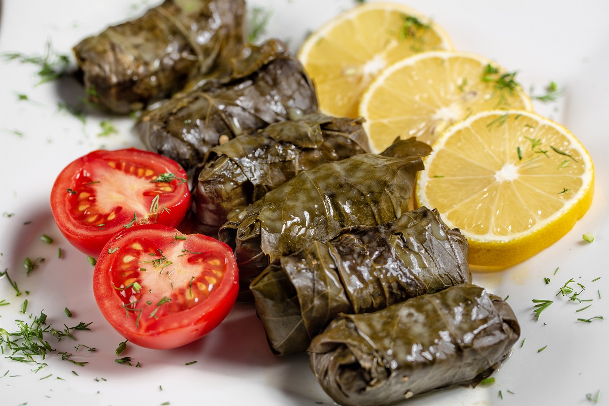 Order Dolma with Sour Cream food online from Suzani Restaurant store, Philadelphia on bringmethat.com
