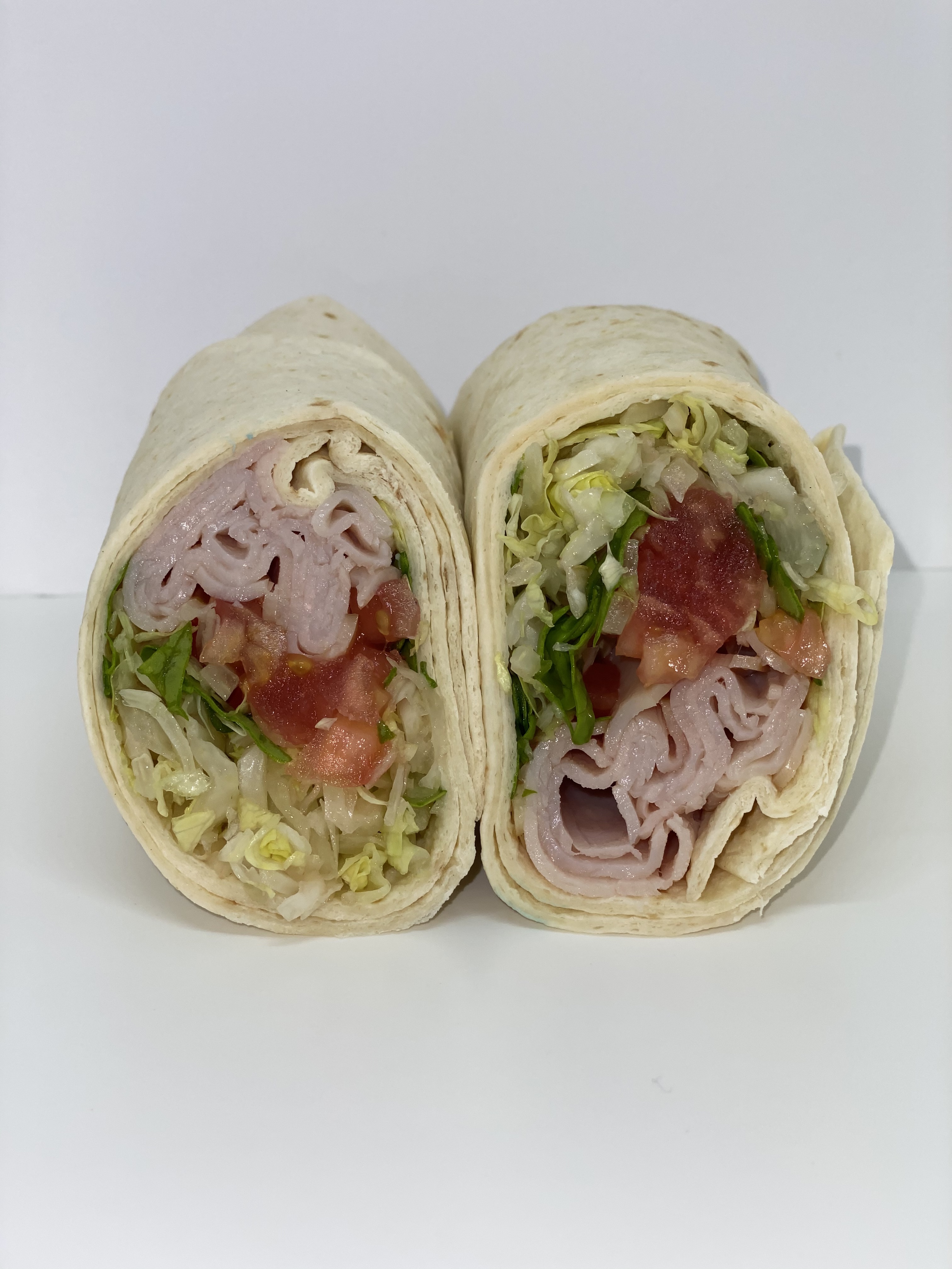Order Chicken Bistro Wrap food online from Pineapple Xpressed Cafe store, McHenry on bringmethat.com