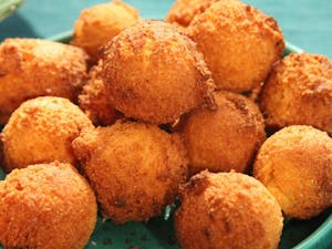 Order Hushpuppies - Large food online from Earp's Seafood Market store, Raleigh on bringmethat.com