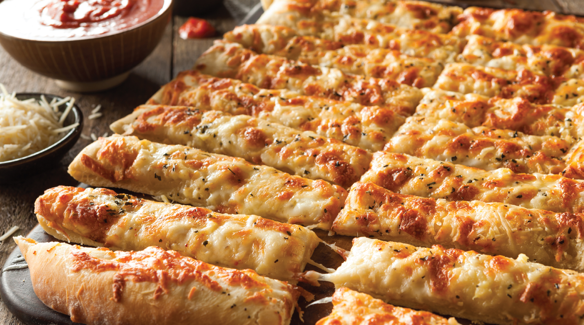 Order 4 Pieces Cheesy Stix & 1 Dip food online from Noble Roman Pizza store, Glenview on bringmethat.com