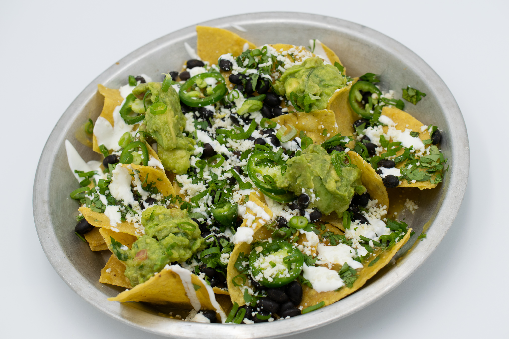 Order Mean Green Nacho food online from Cantina 62 store, Amherst on bringmethat.com
