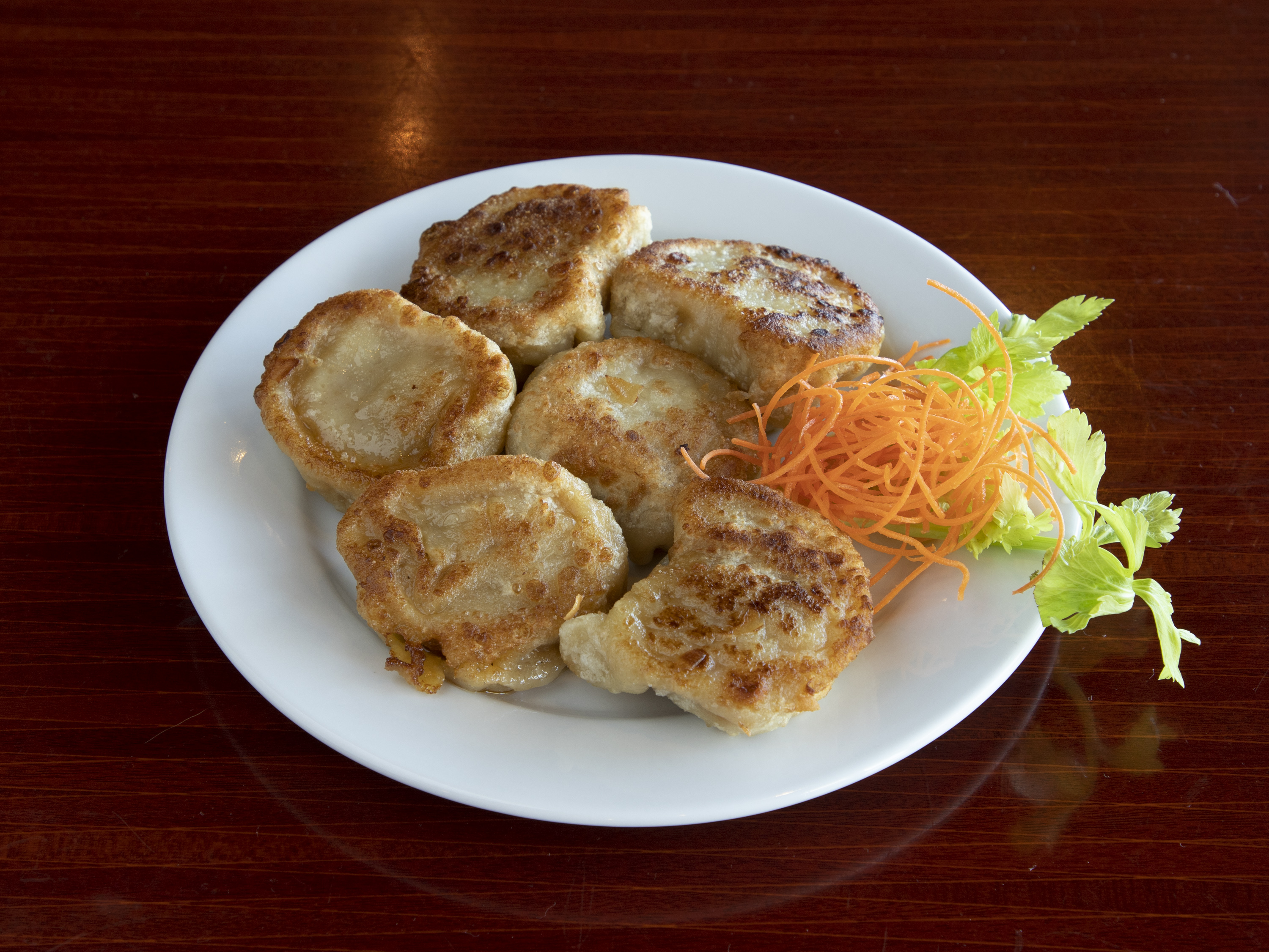 Order Pot Stickers food online from China Isle Restaurant store, American Fork on bringmethat.com