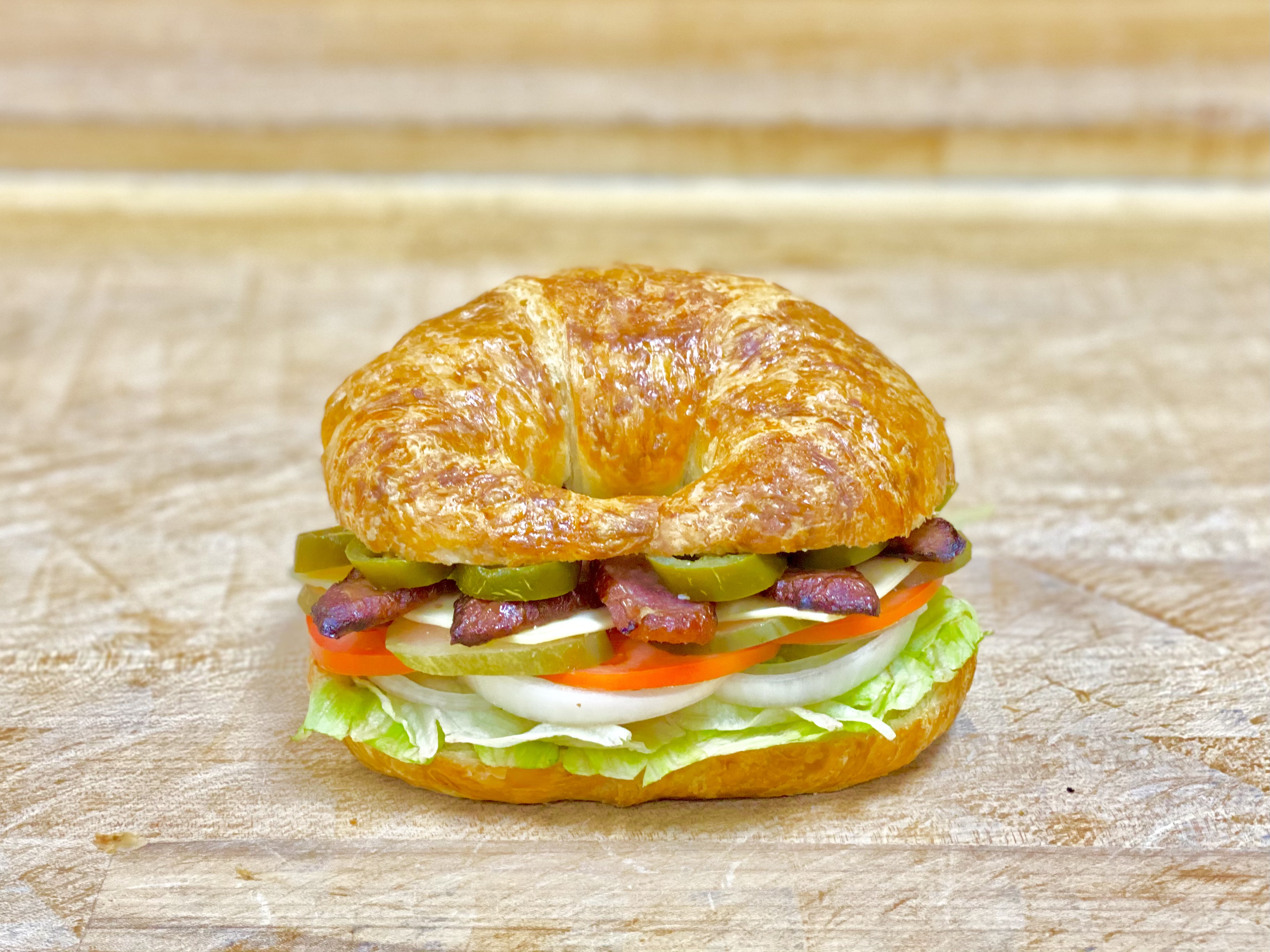 Order L-9 Sausage & Cheese Croissant  food online from K-Inn Donuts store, Paramount on bringmethat.com