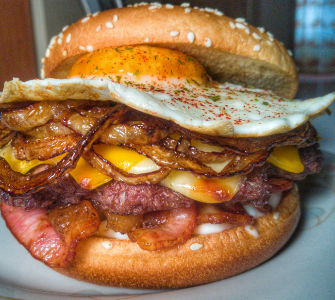 Order Egg and Bacon Cheeseburger food online from Janik's Cafe store, Chicago on bringmethat.com