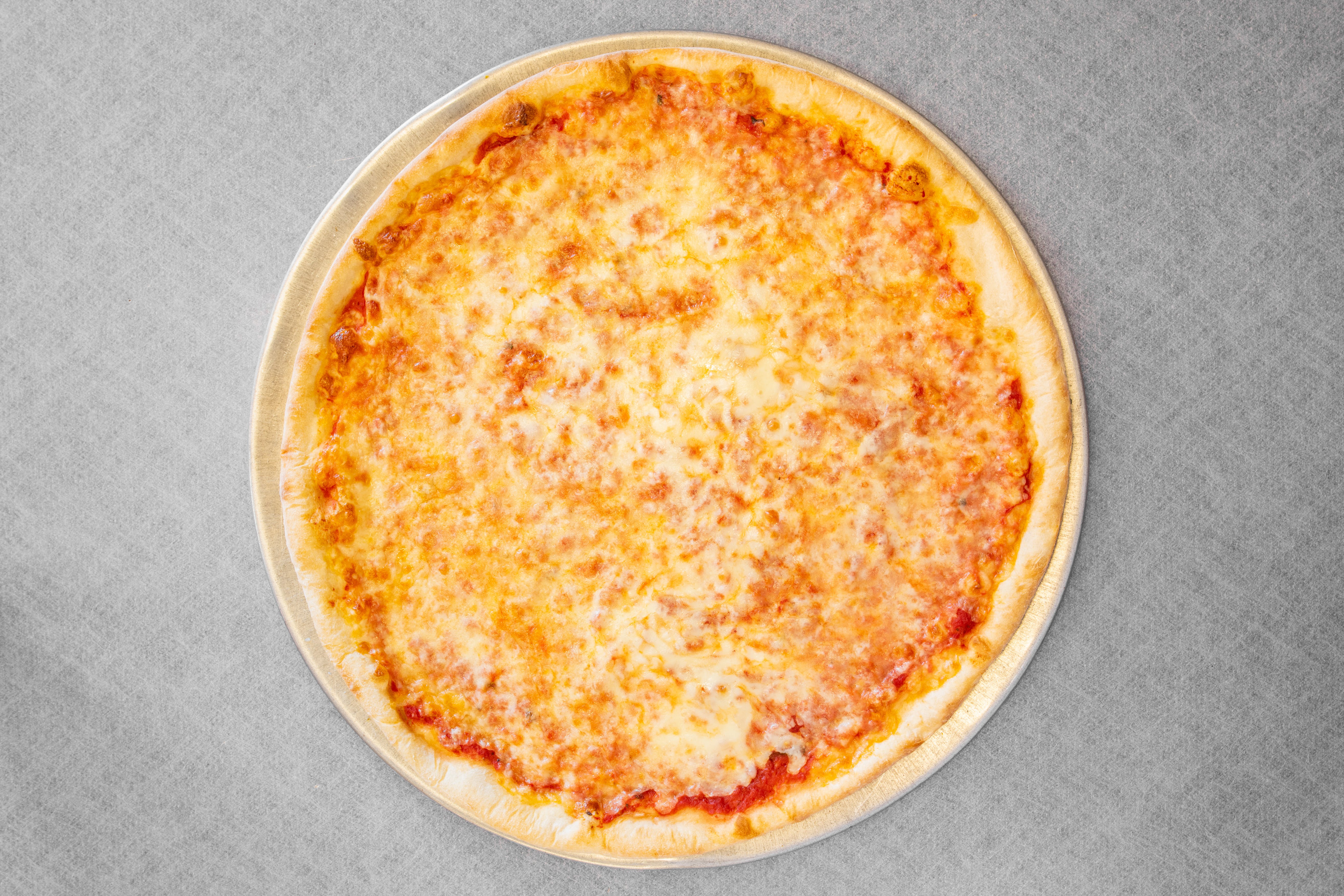 Order Cheese Pizza - Medium 14'' food online from Emilios Restaurant & Pizzeria store, Manalapan Township on bringmethat.com