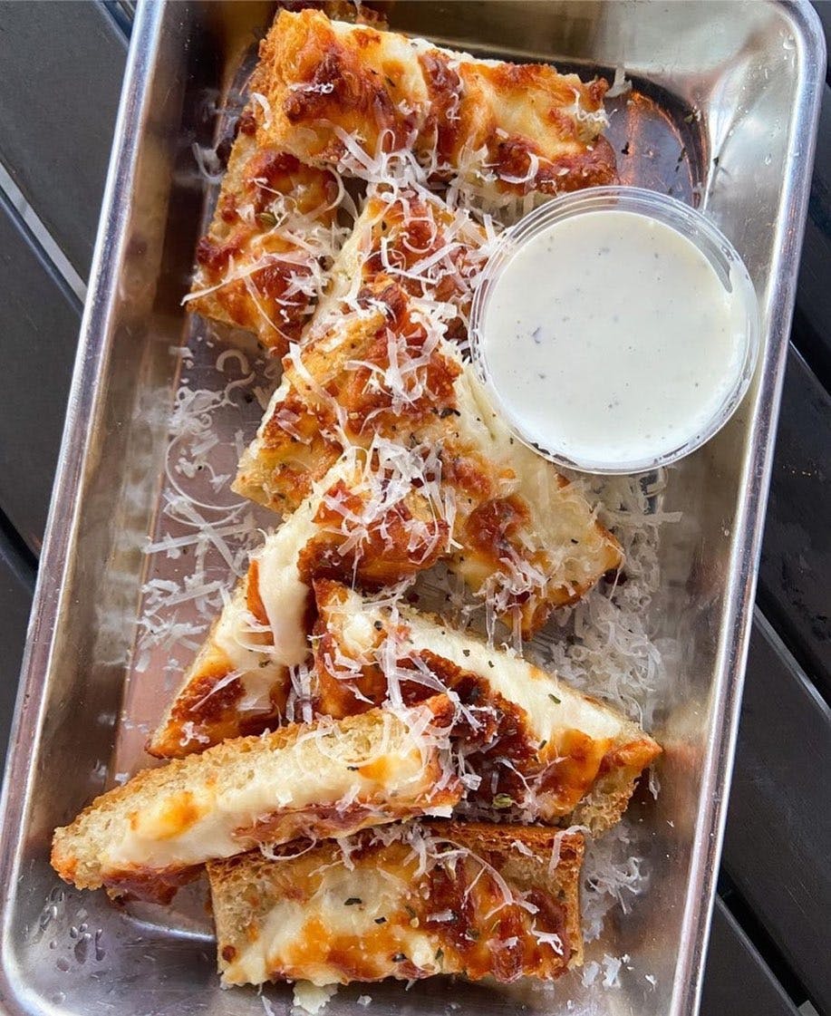 Order Cheesy Bread - Appetizer food online from Shorties Pizza + Grinders store, Austin on bringmethat.com