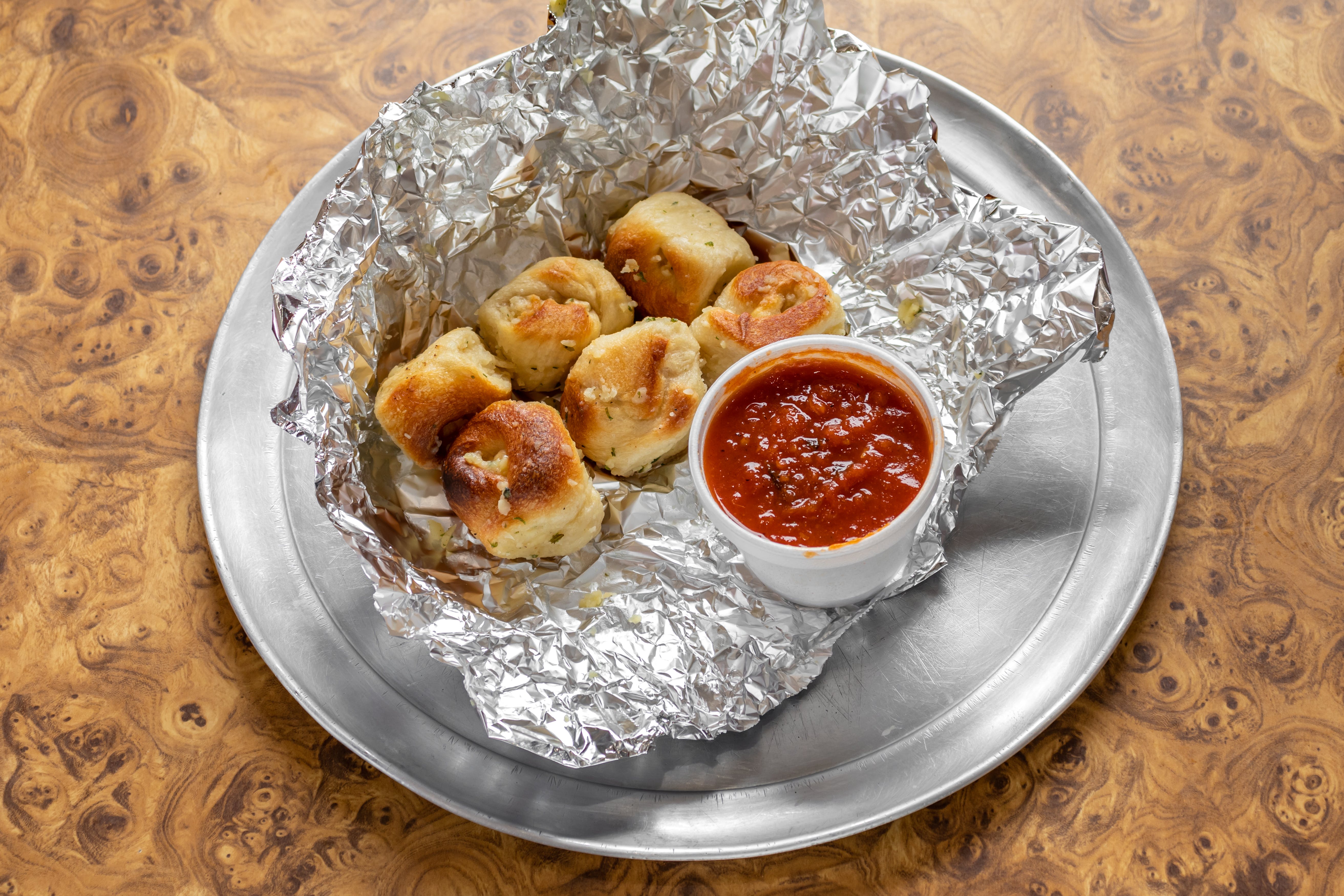 Order Garlic Knots - 6 Pieces food online from Primos Pizza store, New Windsor on bringmethat.com