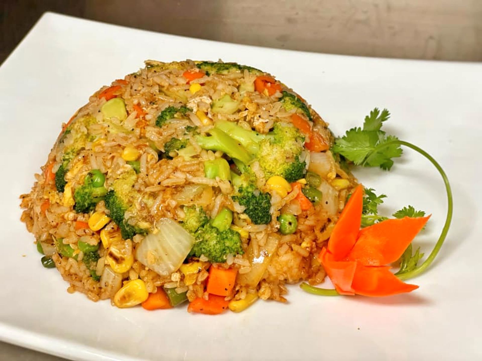 Order CAJUN RICE WITH VEGETABLE food online from Super Crab Juicy Seafood store, Rochester on bringmethat.com
