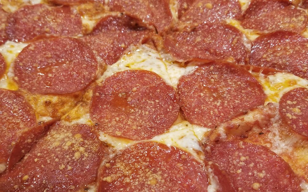 Order Pepperoni Pizza - Medium 12'' food online from Pizza Schmizza Pub & Grub store, Beaverton on bringmethat.com