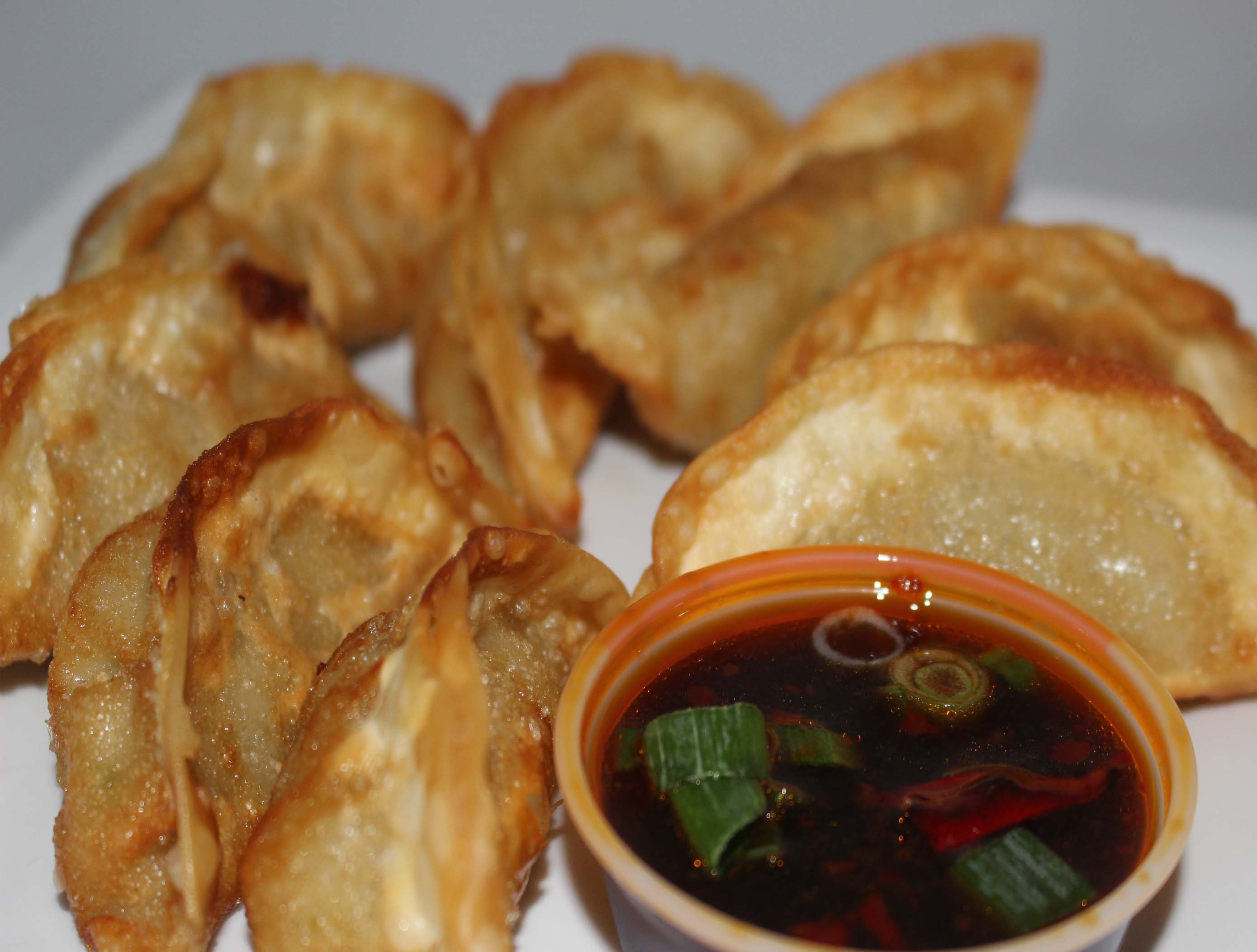 Order 8 Piece Pot Stickers food online from Wok This Way store, San Antonio on bringmethat.com