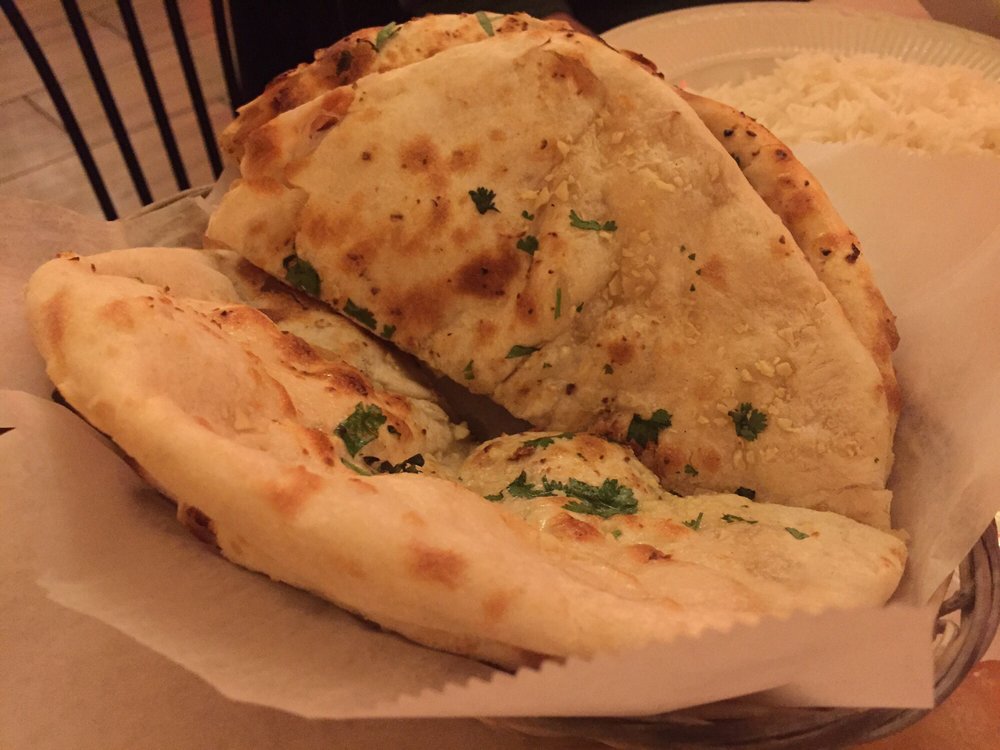 Order Garlic Naan food online from Southern Spice store, New Hyde Park on bringmethat.com