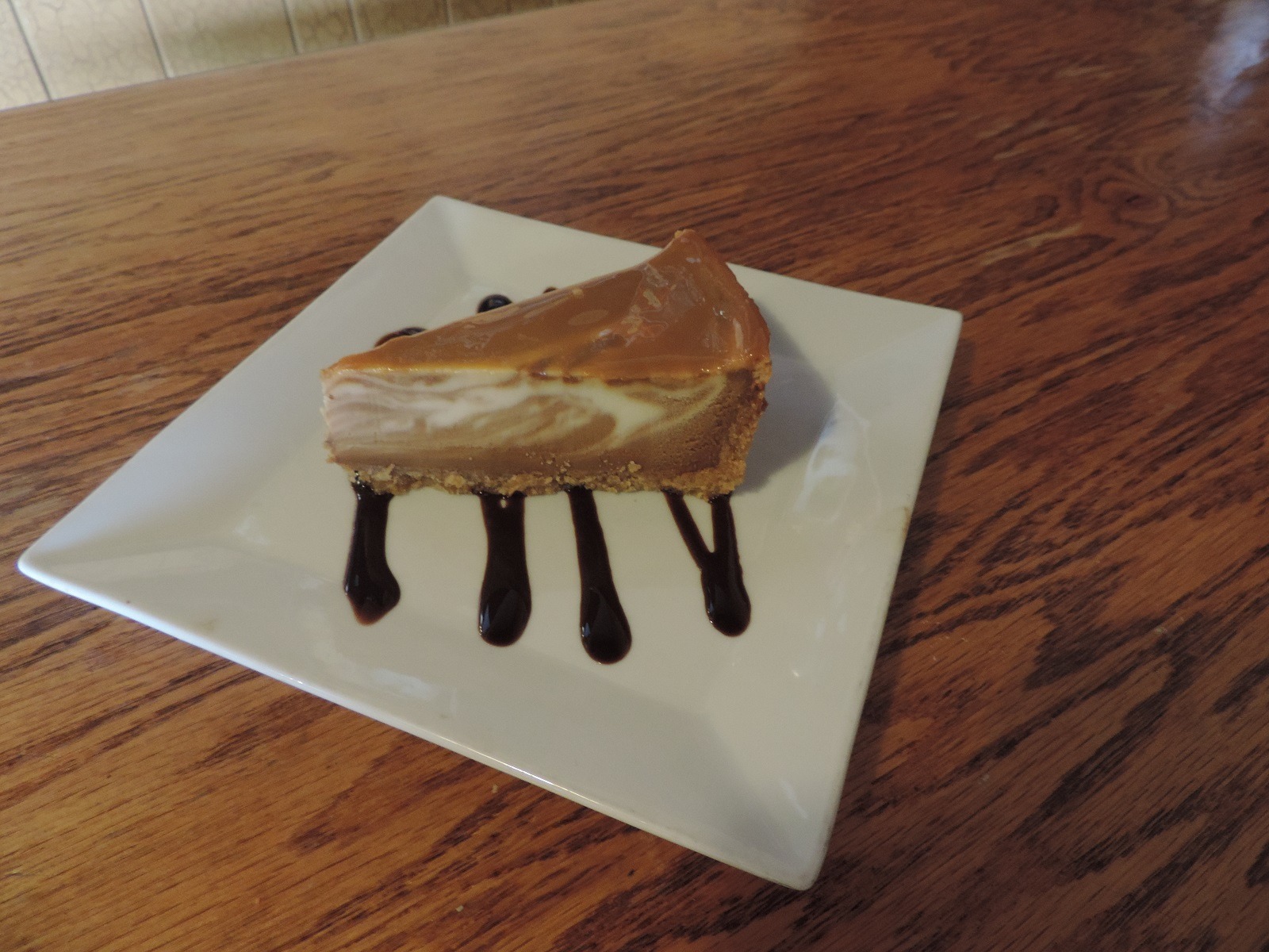 Order Salted Caramel Cheesecake food online from Big Apple Pizza store, Port Saint Lucie on bringmethat.com