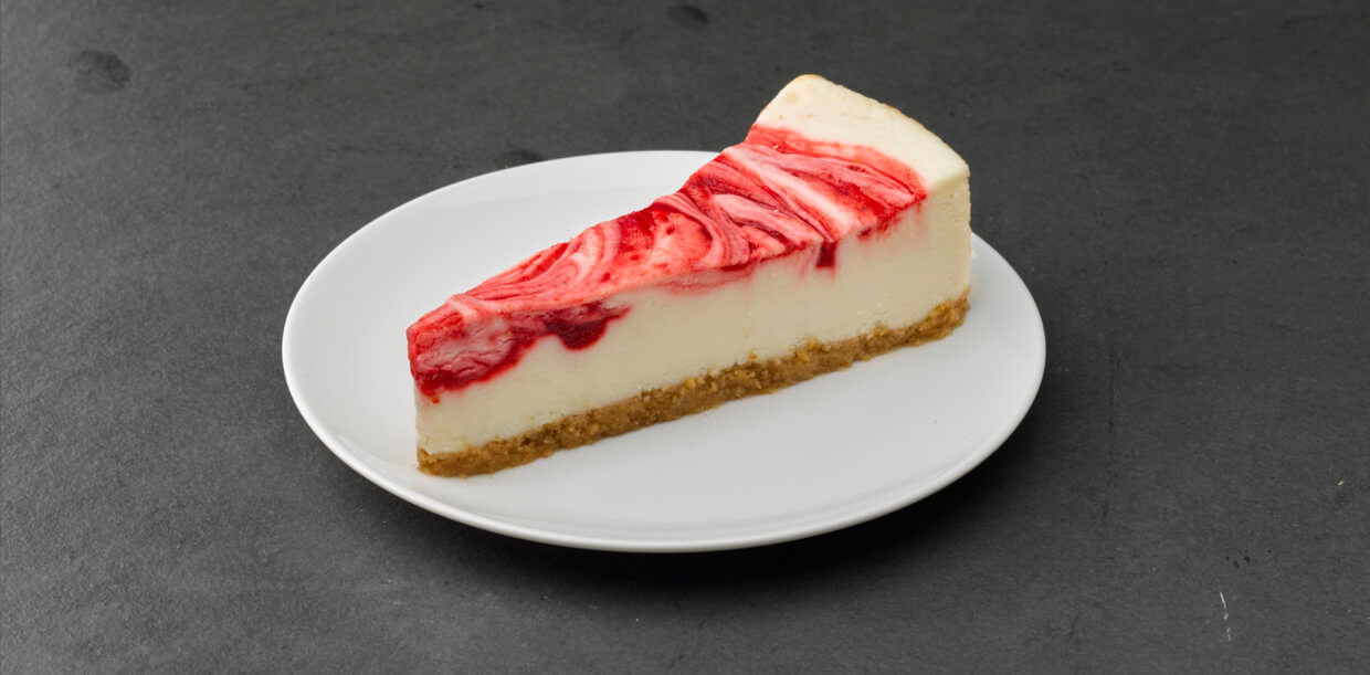 Order Slice of Strawberry Swirl Cheesecake food online from Bravo Pizza store, Los Angeles on bringmethat.com