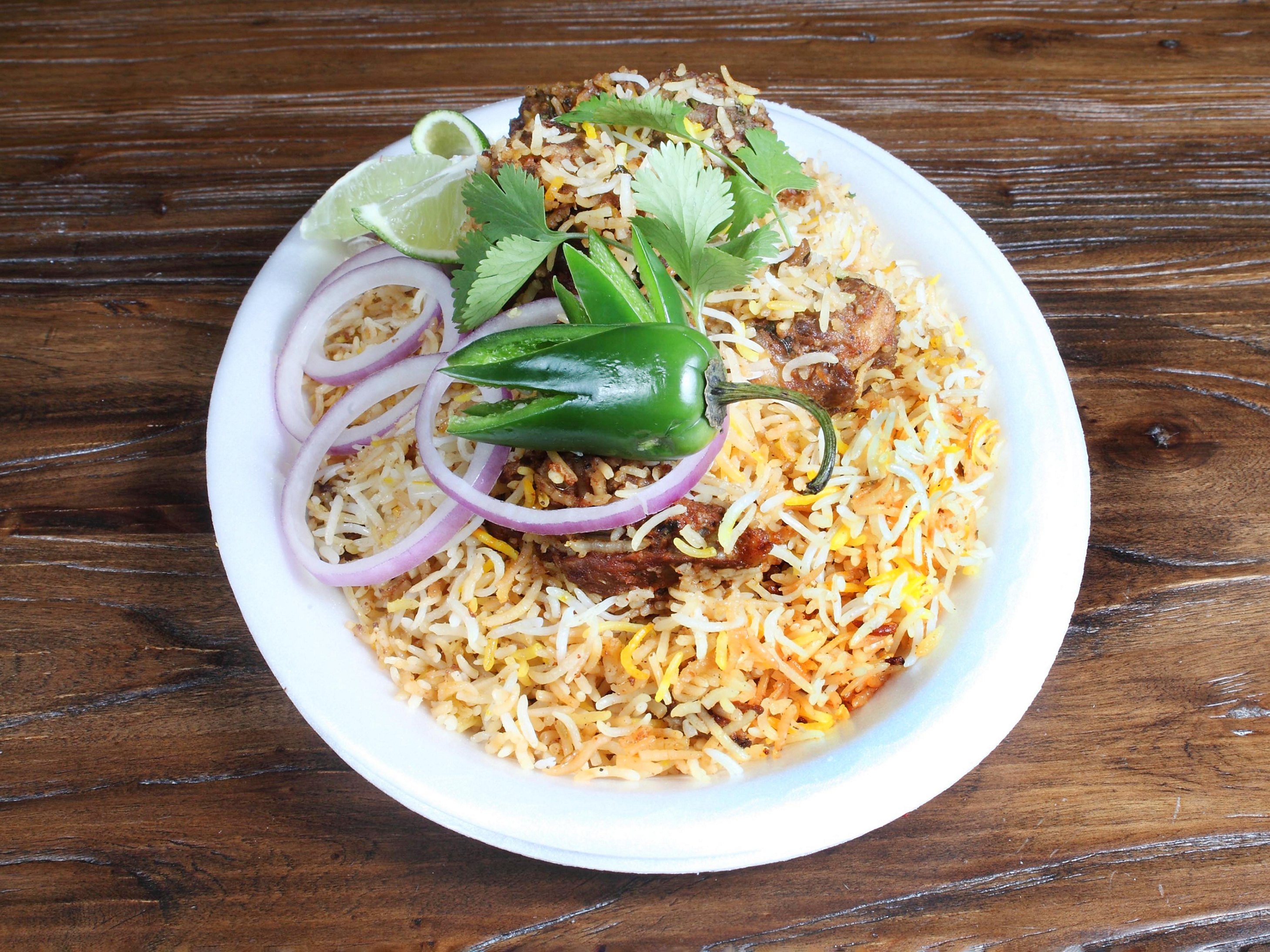 Order Goat Dum Biryani food online from Nawabs Kebabs store, Charlotte on bringmethat.com