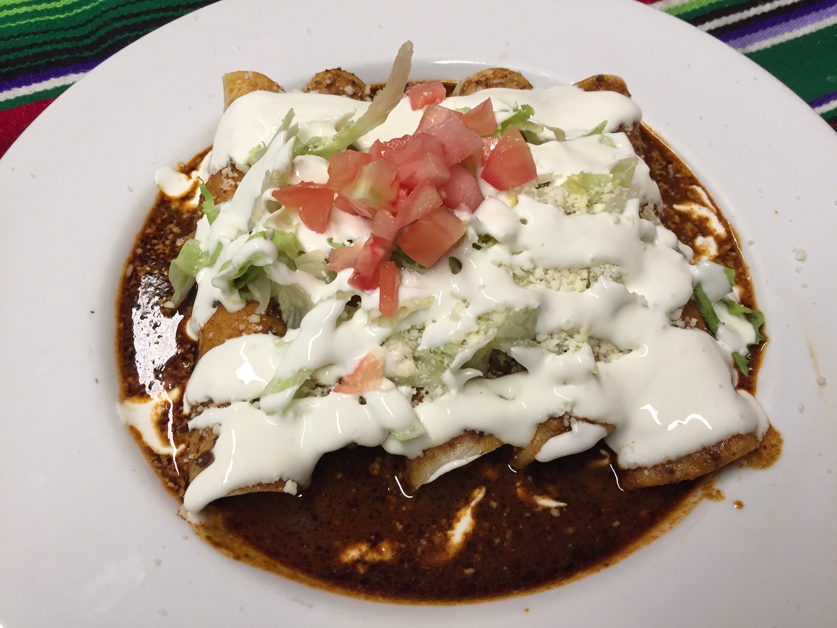 Order CHICKEN ENCHILADAS DE MOLE food online from Montes Cafe store, Seaside Heights on bringmethat.com