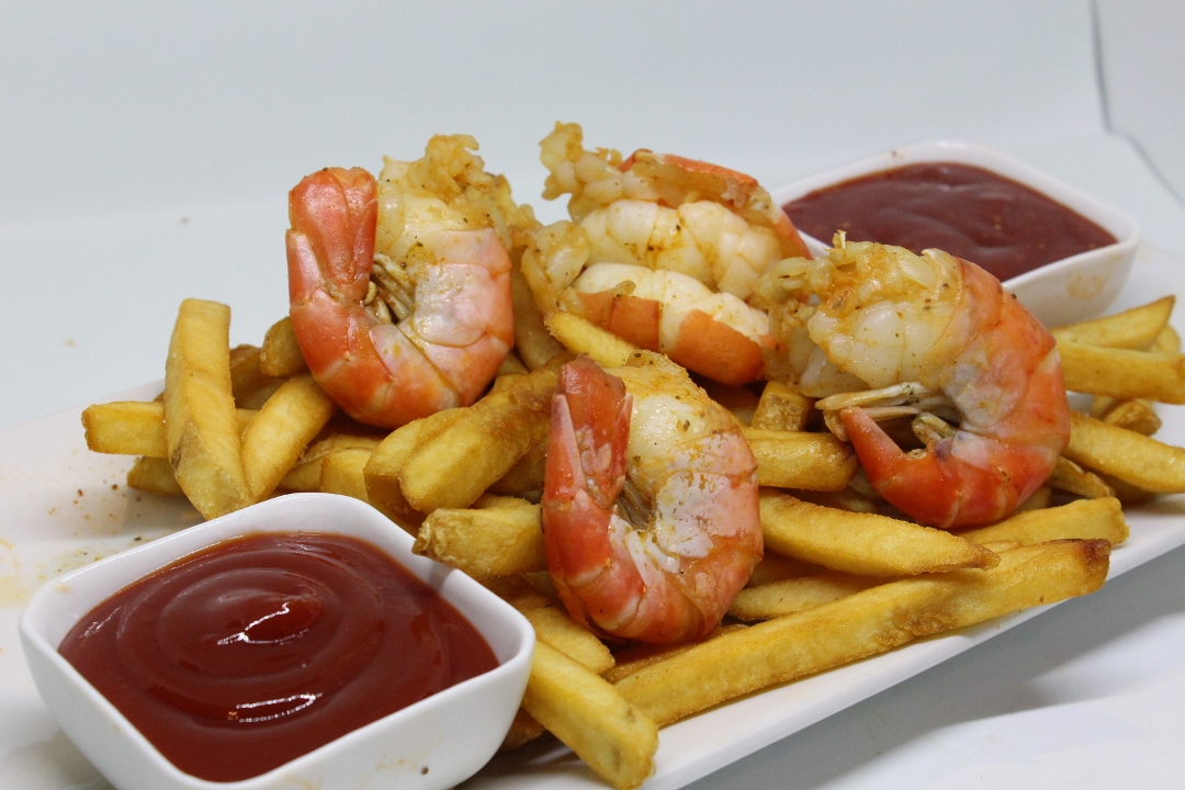 Order COLOSSAL SHRIMP (QTY 4) food online from First Break Sports Bar store, Sterling on bringmethat.com