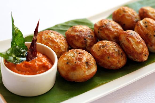 Order Kuli Paniyaram food online from Arusuvai Indian Restaurant at Somerville store, Somerville on bringmethat.com