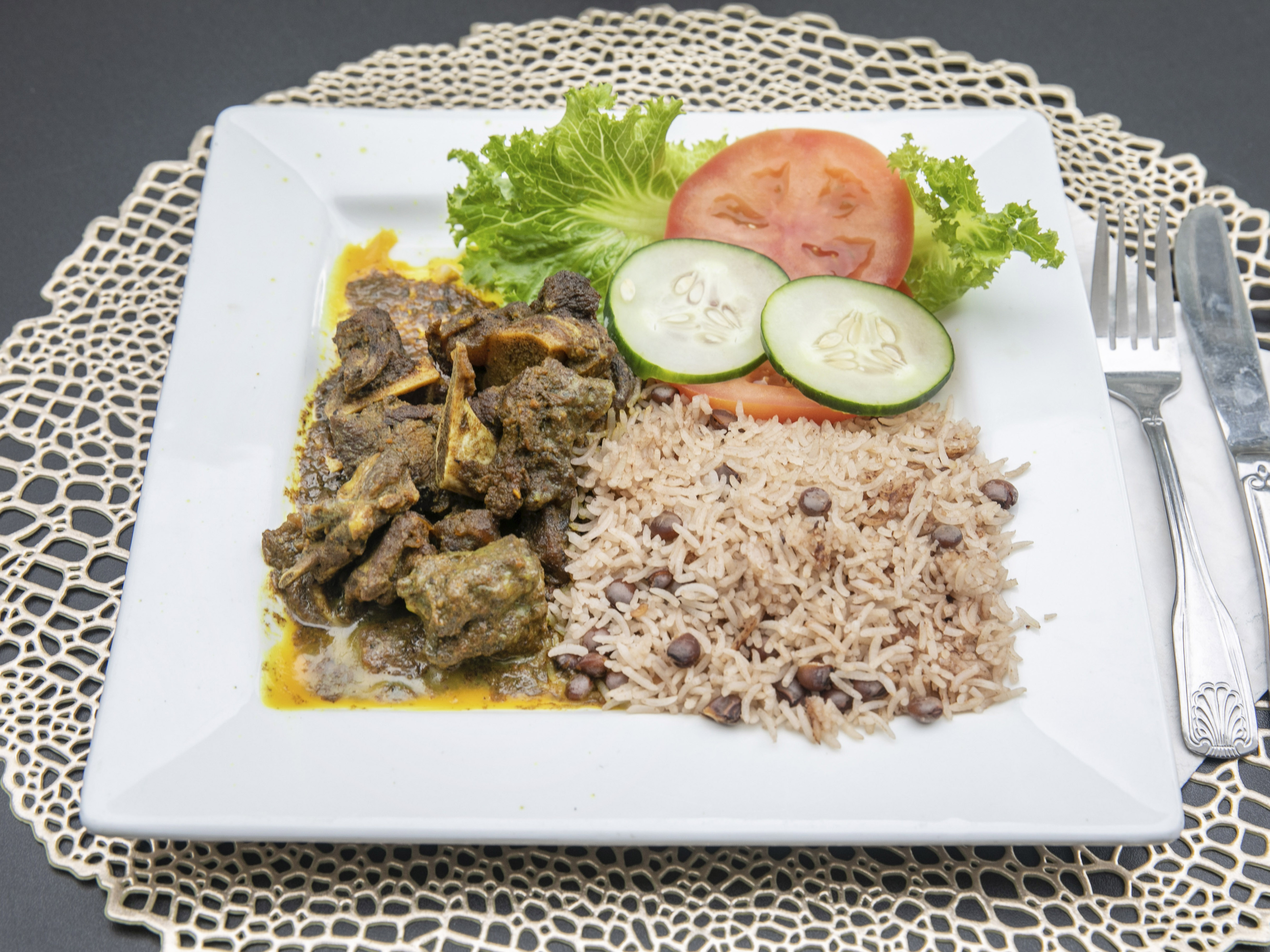 Order Curried Goat Meal food online from Eclipse Ultra Lounge store, Columbus on bringmethat.com